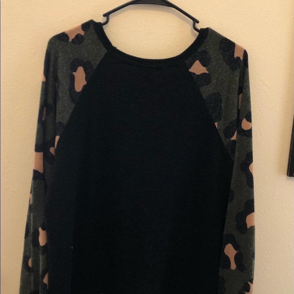 Long sleeve sweater shirt.